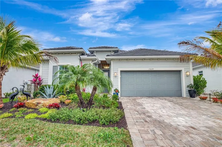View of front of property with a garage
