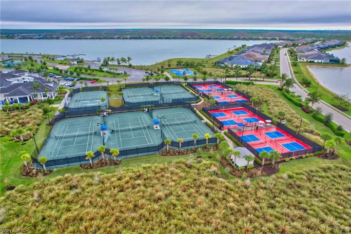 Birds eye view of Pickle Ball and Tennis Courts with the Lake as a soothing backdrop