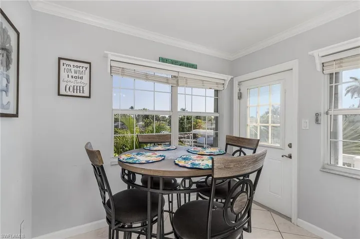 Tiled dining area with ornamental molding
