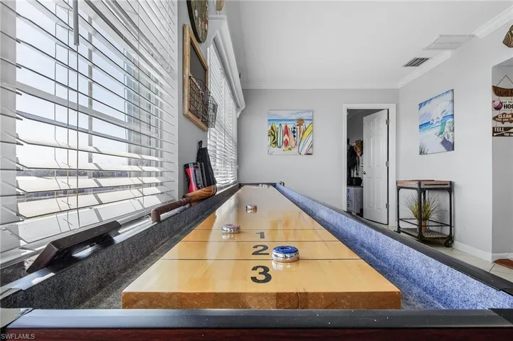 Playroom featuring crown molding