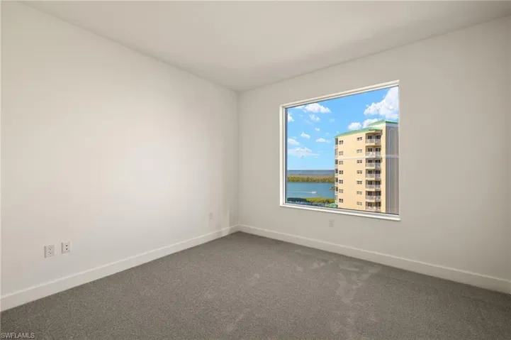 Bedroom 3 , plush carpeting , large closet and beautiful water views