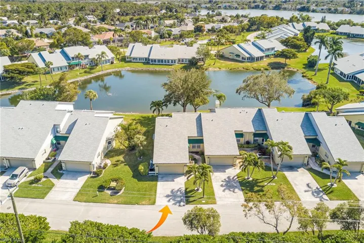 View from above of property with a nearby body of water