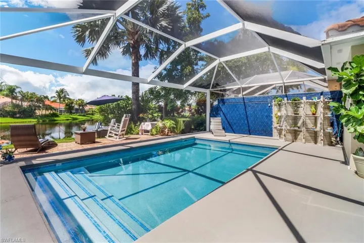 Newly resurfaced pool with new picture window screen
