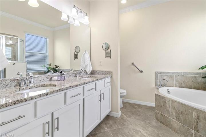 Primary bath, granite countertops, dual sinks, garden tub and shower