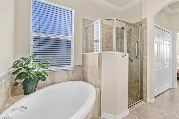 Primary bathroom shower and tub