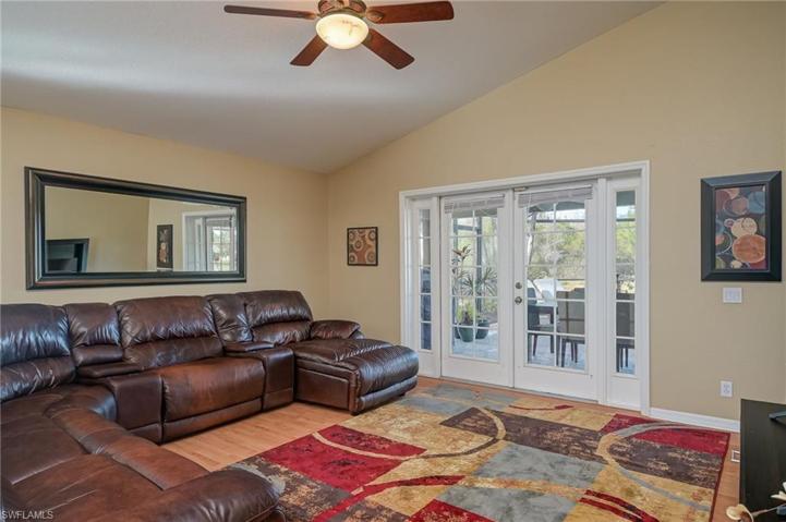 Family room looks out to pool patio.
