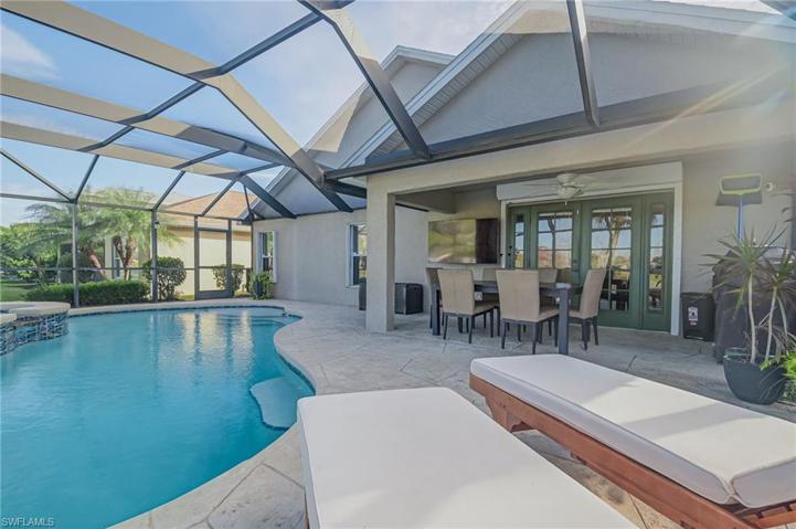 Watch a game from your lanai with the 65" TV!