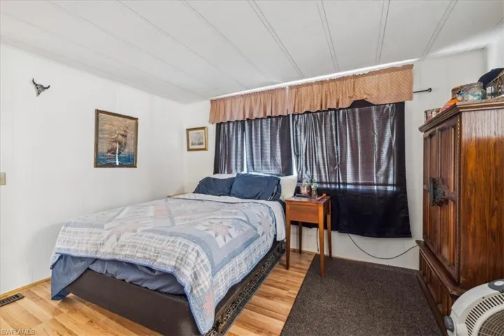 Bedroom featuring wood finished floors
