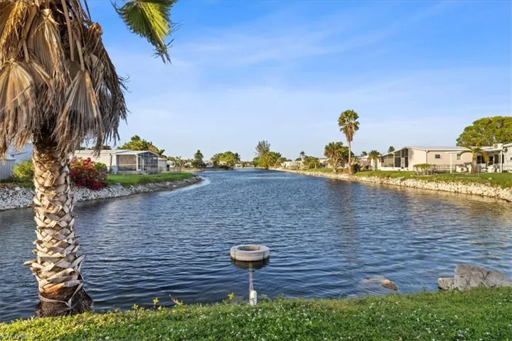 Water view featuring nearby suburban area