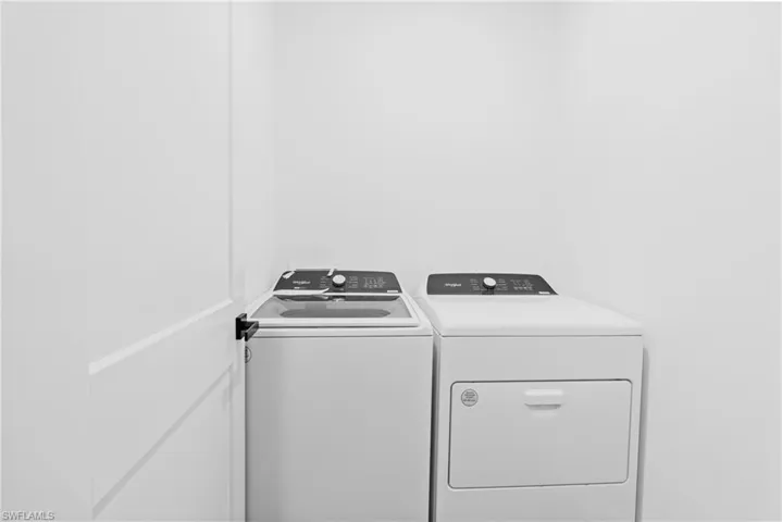 Laundry room with separate washer and dryer