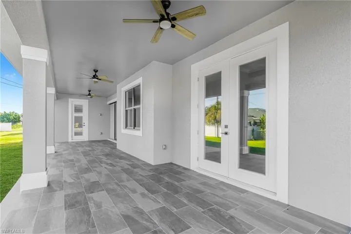 View of patio / terrace with ceiling fan and french doors