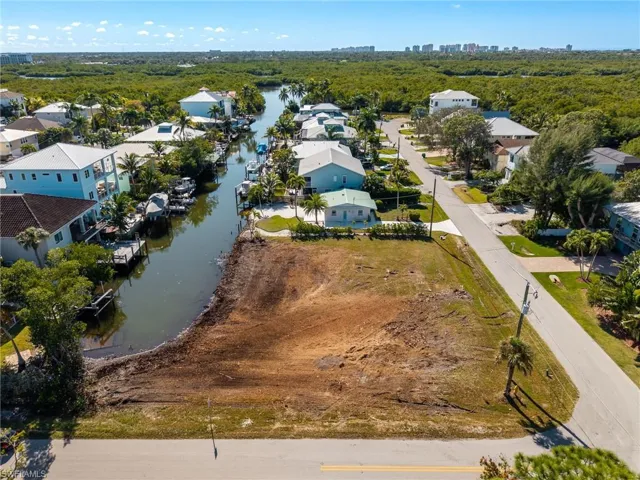 Aerial view of residential area with a nearby body of water