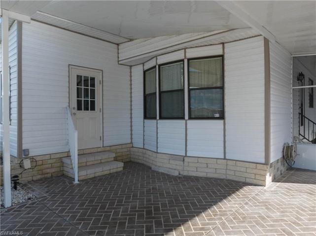 Front door into newly remodeled porch