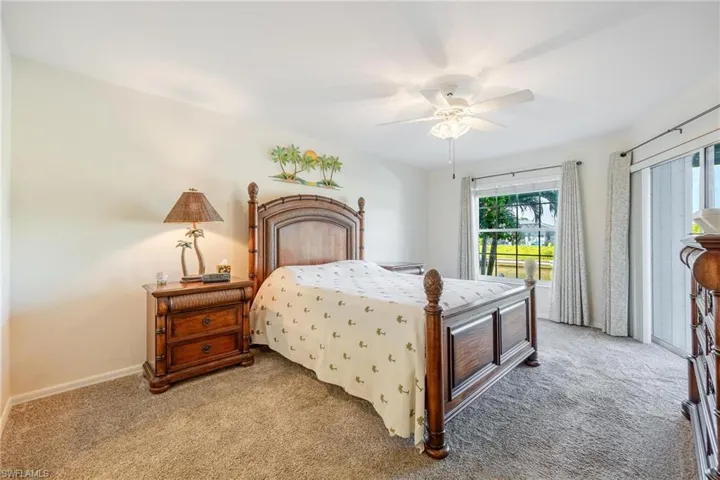 Primary bedroom with ceiling fan