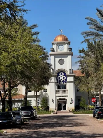 IslandWalk Town Center featuring iconic clock tower, charming streetscape, and vibrant community hub.