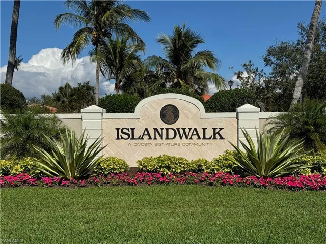 Welcome to IslandWalk, a premier gated community with lush tropical landscaping and resort-style amenities.