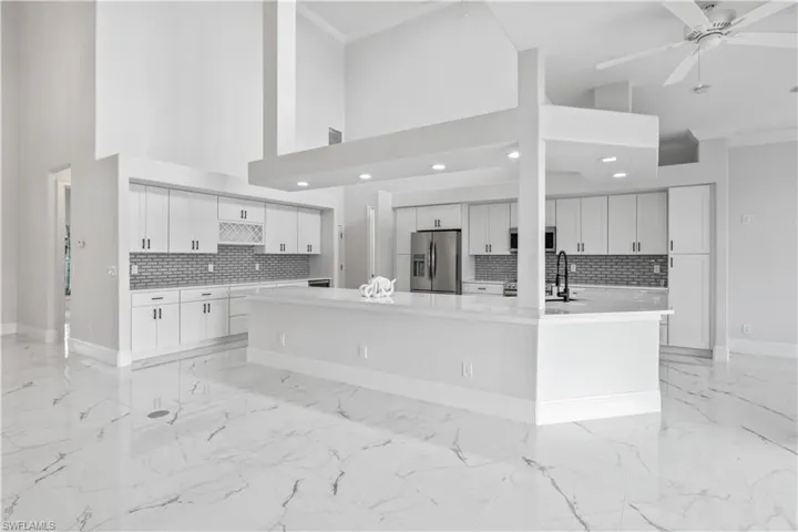 A gourmet kitchen with everything you need to cook, entertain, and gather—complete with a spacious pantry and luxurious finishes.