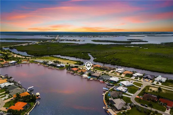 An aerial view of your new kingdom—intersecting canals, serene surroundings, and direct Gulf access await.