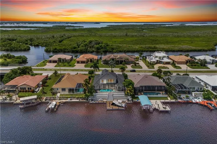 This high-elevation home stands tall above the rest, offering peace of mind and unmatched views of the surrounding waterways and neighborhood.