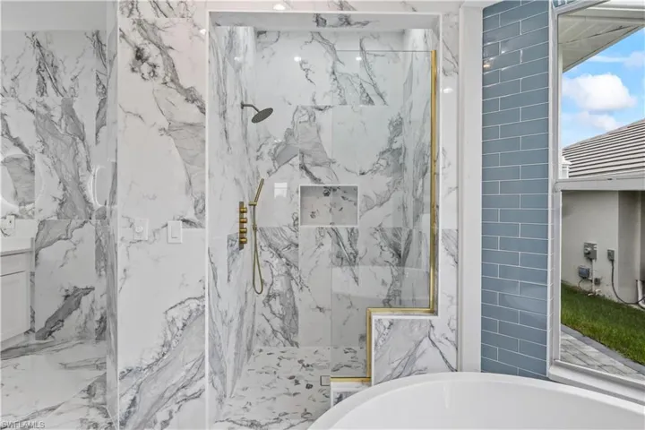 A spa-inspired master bath, walk-in shower, and a soaking tub that beckons you to relax.