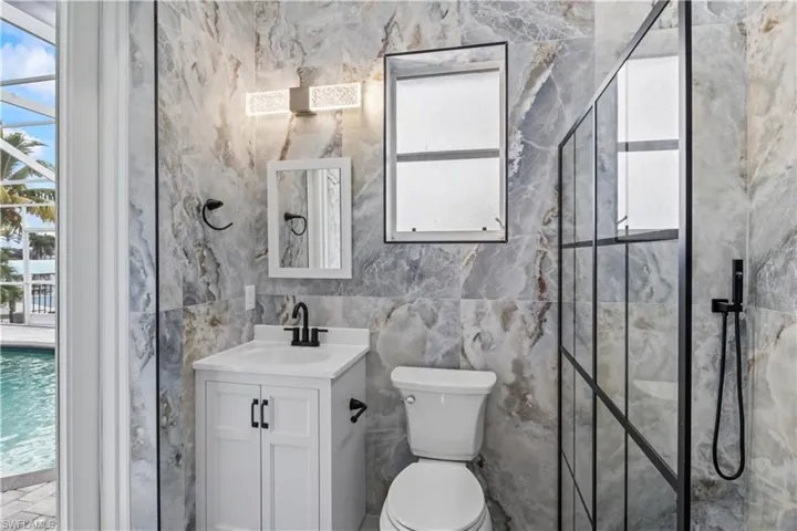Pool-friendly guest bath designed for comfort and convenience.