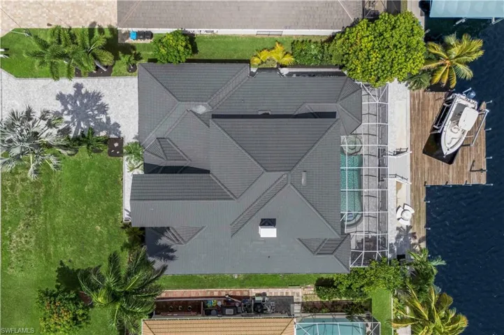 Aerial view capturing the full scope of this luxurious property and its stunning surroundings.