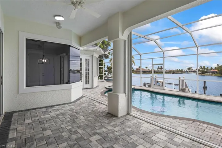 Enjoy the Florida lifestyle year-round with a sparkling pool, built-in spa, and screened lanai for ultimate relaxation.