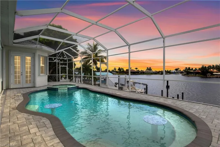 This resort-style pool and spa overlook the water and offer the perfect setting for sunrise swims and sunset soaks.