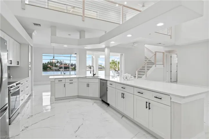 A kitchen that truly has it all—design, storage, appliances, and flow...AND a view!