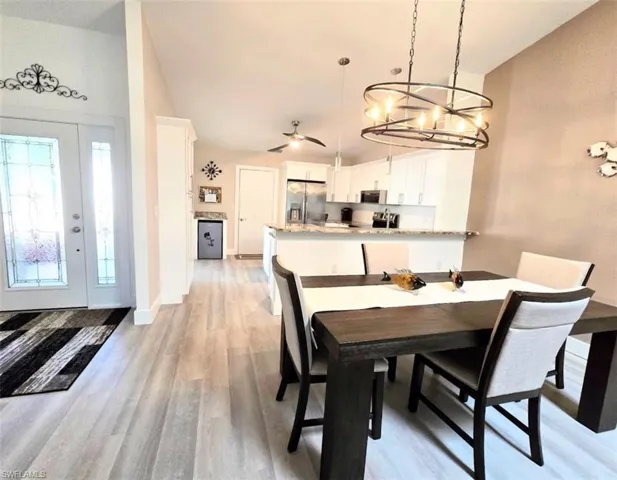 Foyer & Dining Area Looking Towards Kitchen