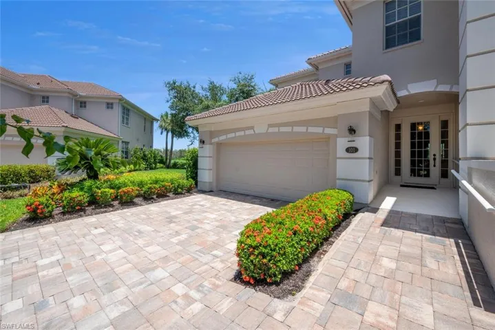 Attached 2 car garage with extra green space