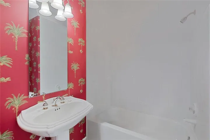 Bathroom serves guests/family located conveniently in hall area