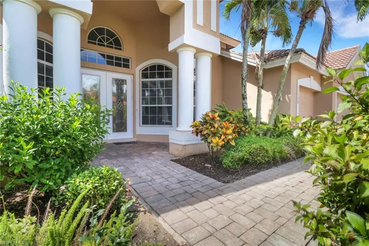 Entrance to home featuring french doors