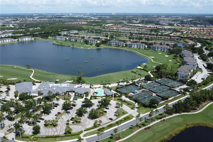 Aerial view of the amenity center with a water view