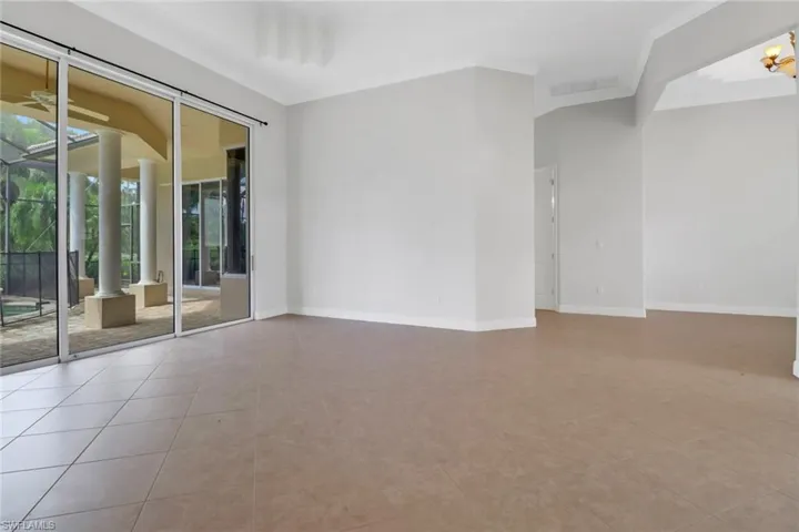 Living room featuring tile flooring & plenty of natural light