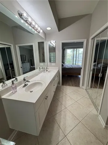 Double vanity featuring an integrated countertop and two undermount sinks