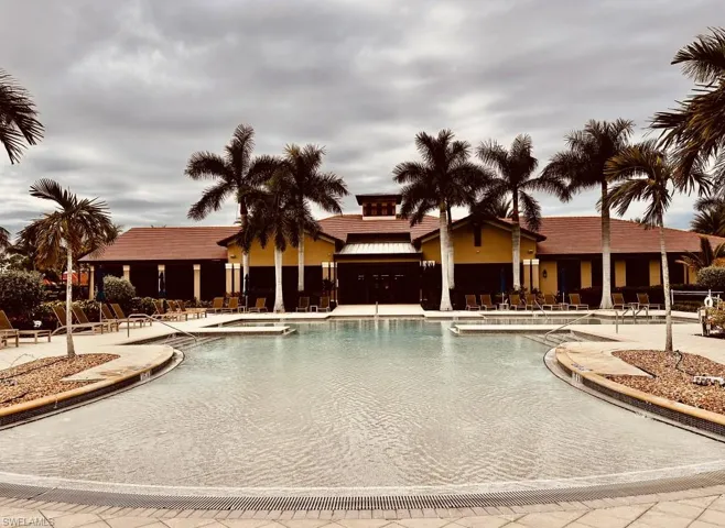 View of community featuring a lawn