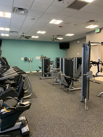 Gym featuring a paneled ceiling