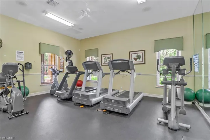 Workout area featuring a ceiling fan