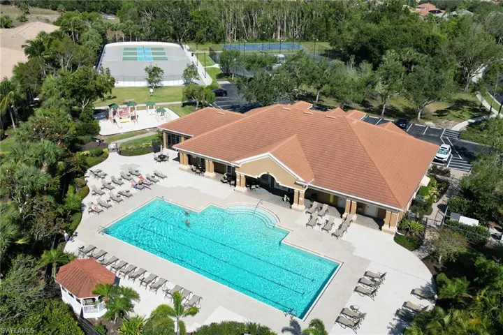 Community pool with a patio area