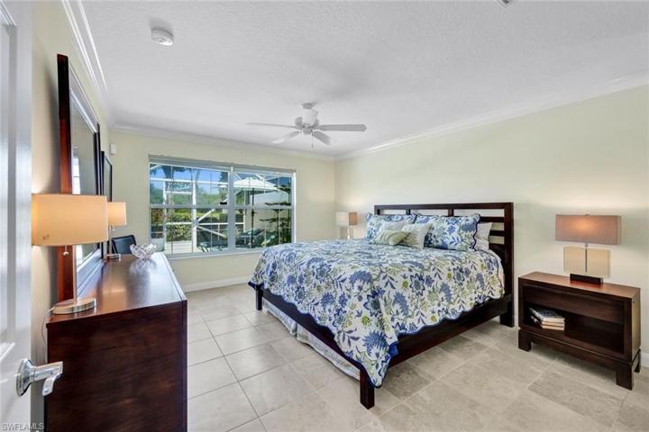Generous Master Bedroom has Crown Molding