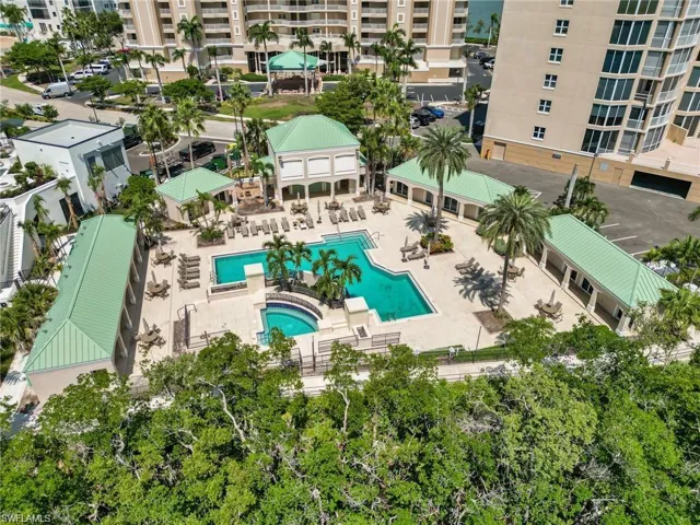 Birds eye view of property with resort style pool