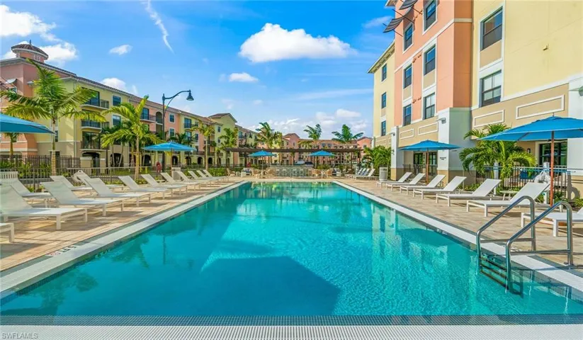 Pool featuring a patio area and fence