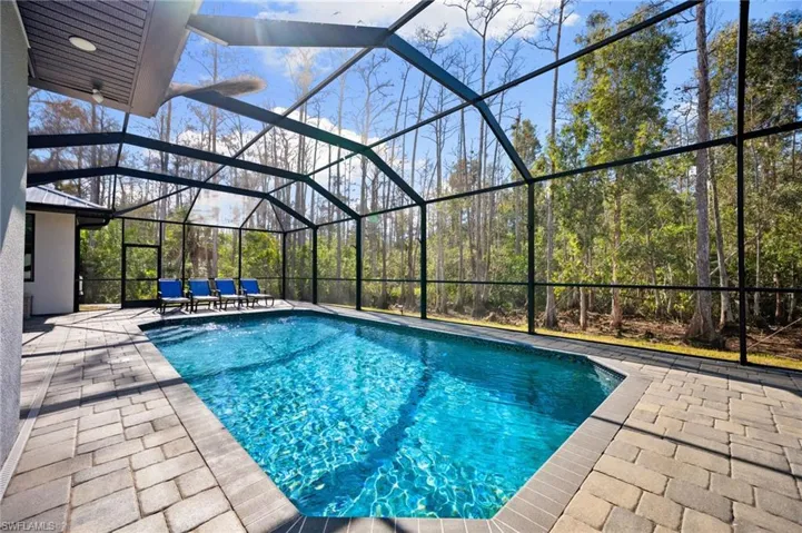 Stunning & immaculately maintained residence offers a gorgeous wooded nature view (no neighbors to be seen in the back!)