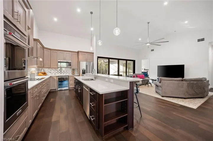 INCREDIBLE floor plan with 3,746 sq ft under air including 5 bedrooms + 2 dens + formal dining space, including a private in-law suite