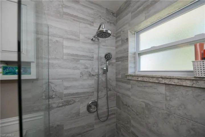Ceramic tile shower with glass door