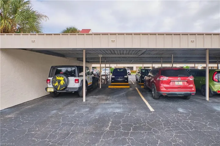 Covered parking spot #30 is deeded to this property.