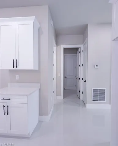 Hallway with baseboards
