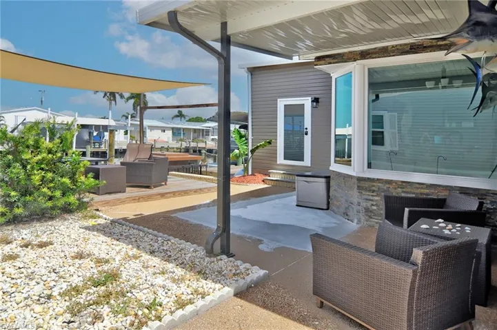 View of patio featuring an outdoor living space and a residential view