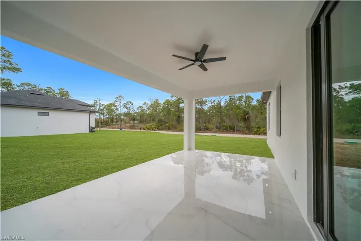 View of patio / terrace with a ceiling fan